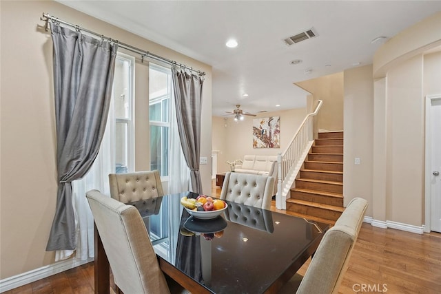 15561 Jasmine Pl, Tustin, CA 92782 - dining room featuring stairway, wood finished floors, baseboards, and recessed lighting