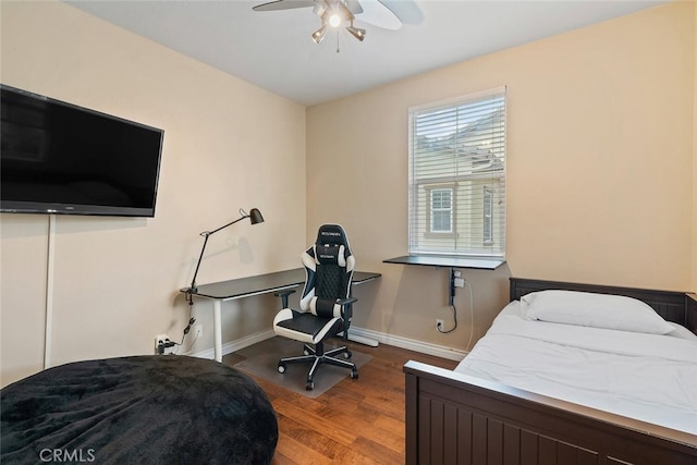 15561 Jasmine Pl, Tustin, CA 92782 - bedroom with wood finished floors, baseboards, and ceiling fan