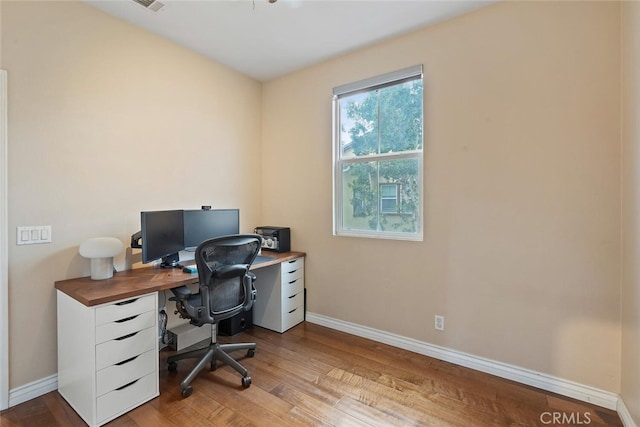 15561 Jasmine Pl, Tustin, CA 92782 - office featuring wood finished floors and baseboards