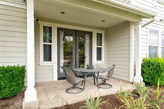 15561 Jasmine Pl, Tustin, CA 92782 - view of patio / terrace with french doors and outdoor dining area