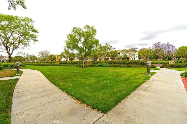 15561 Jasmine Pl, Tustin, CA 92782 - view of home's community featuring a lawn and a residential view