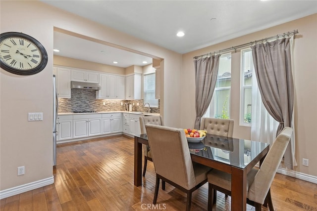 15561 Jasmine Pl, Tustin, CA 92782 - dining space with baseboards, light wood-style flooring, and recessed lighting