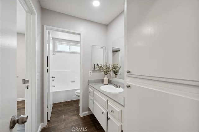 1530 N Grove St, Redlands, CA 92374 - full bath with vanity, toilet, wood finished floors, and shower / bathtub combination