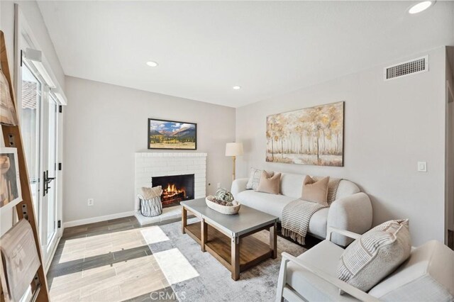 1530 N Grove St, Redlands, CA 92374 - living area featuring a fireplace, recessed lighting, and baseboards