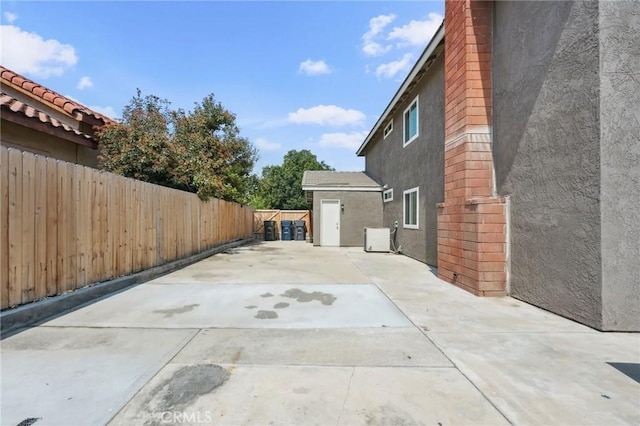 1530 N Grove St, Redlands, CA 92374 - view of property exterior with stucco siding and a patio area