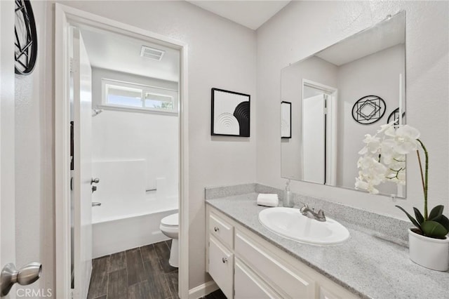 1530 N Grove St, Redlands, CA 92374 - full bath with vanity, toilet, wood finished floors, and shower / tub combination