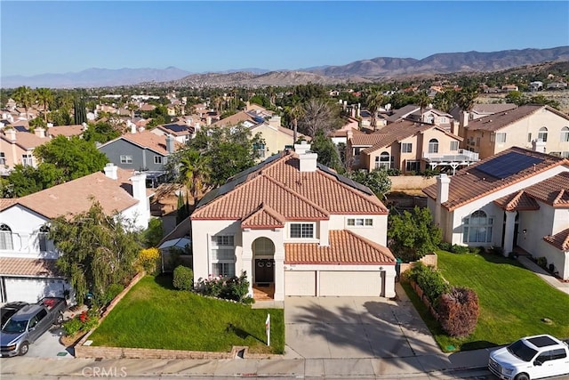 3410 Genoa Pl, Palmdale, CA 93551 - aerial perspective of suburban area featuring a mountainous background