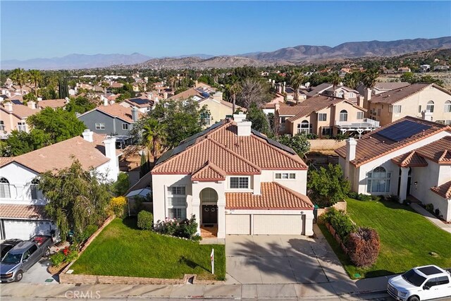 3410 Genoa Pl, Palmdale, CA 93551 - aerial view of residential area with a mountain backdrop