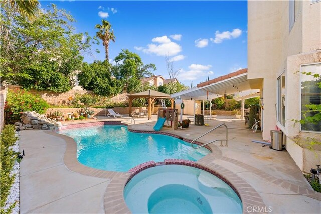 3410 Genoa Pl, Palmdale, CA 93551 - view of swimming pool with a patio area and a pool with connected hot tub