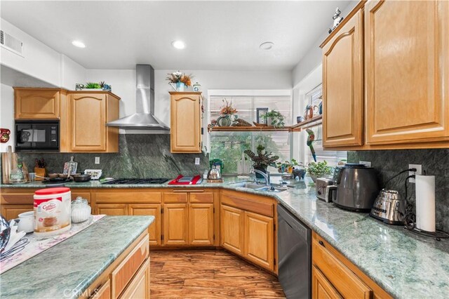 3410 Genoa Pl, Palmdale, CA 93551 - kitchen featuring wall chimney exhaust hood, black appliances, a sink, backsplash, and light wood-type flooring