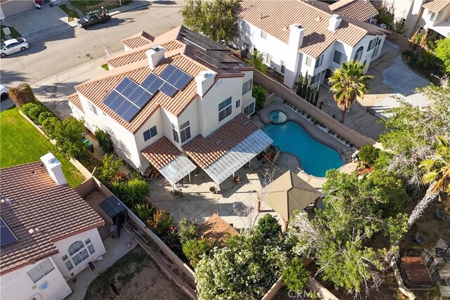 3410 Genoa Pl, Palmdale, CA 93551 - aerial perspective of suburban area with a pool area