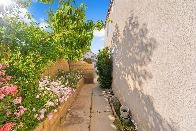3410 Genoa Pl, Palmdale, CA 93551 - view of side of home featuring stucco siding