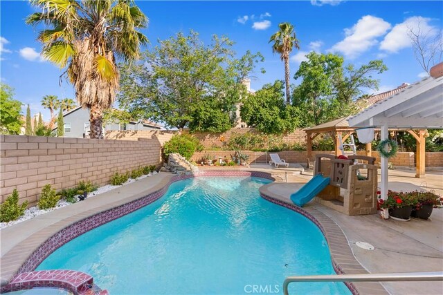 3410 Genoa Pl, Palmdale, CA 93551 - view of swimming pool featuring a gazebo, a fenced backyard, and a patio
