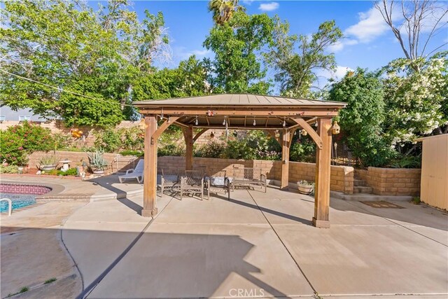 3410 Genoa Pl, Palmdale, CA 93551 - fenced backyard featuring a gazebo and a patio area
