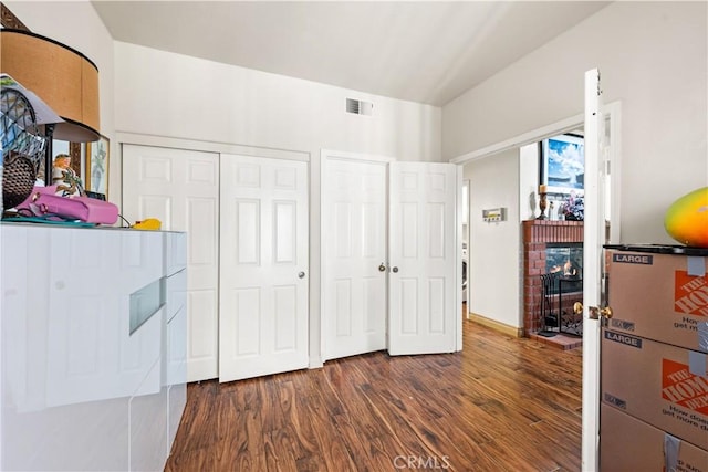 3410 Genoa Pl, Palmdale, CA 93551 - bedroom with a fireplace and wood finished floors