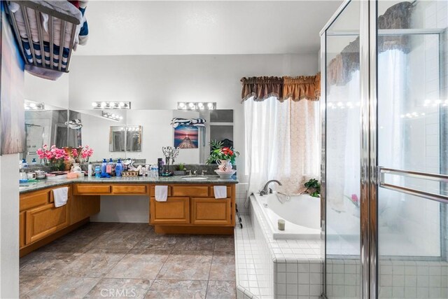 3410 Genoa Pl, Palmdale, CA 93551 - full bath featuring double vanity, a garden tub, and a stall shower