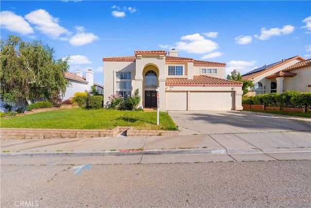 3410 Genoa Pl, Palmdale, CA 93551 - mediterranean / spanish home featuring a tile roof, stucco siding, a chimney, concrete driveway, and a front lawn