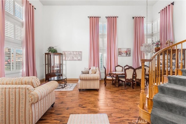 3410 Genoa Pl, Palmdale, CA 93551 - living room with stairs and wood finished floors