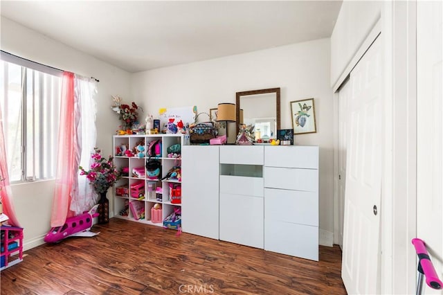 3410 Genoa Pl, Palmdale, CA 93551 - game room featuring dark wood-type flooring