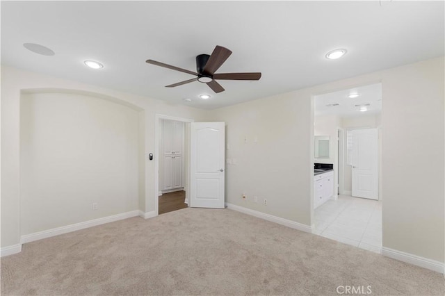 20304 Estuary Ln, Newport Beach, CA 92660 - unfurnished bedroom featuring light colored carpet, baseboards, connected bathroom, and recessed lighting