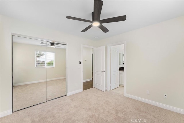 20304 Estuary Ln, Newport Beach, CA 92660 - unfurnished bedroom featuring carpet flooring, a closet, and baseboards