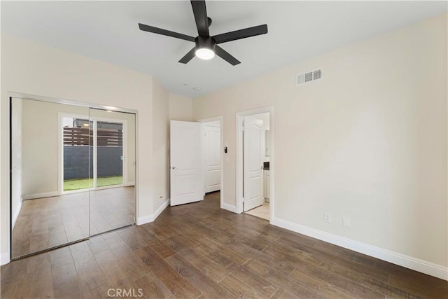 20304 Estuary Ln, Newport Beach, CA 92660 - unfurnished bedroom featuring wood finished floors, baseboards, ceiling fan, and access to outside