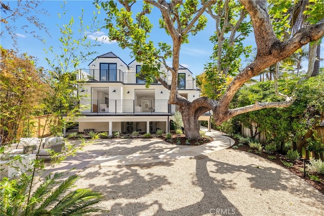 1759 Glenneyre St, Laguna Beach, CA 92651 - back of property with a balcony and stucco siding