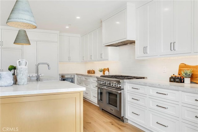1759 Glenneyre St, Laguna Beach, CA 92651 - kitchen with double oven range, a sink, white cabinets, and recessed lighting
