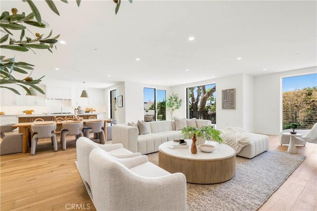 1759 Glenneyre St, Laguna Beach, CA 92651 - living room with recessed lighting, plenty of natural light, and light wood-style floors