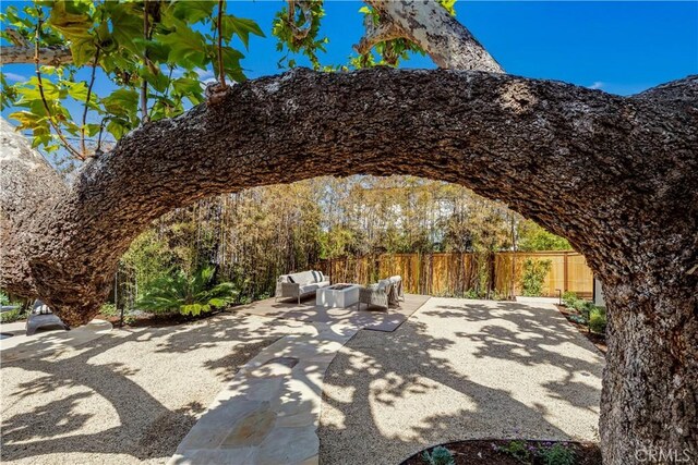 1759 Glenneyre St, Laguna Beach, CA 92651 - view of patio featuring an outdoor living space and fence