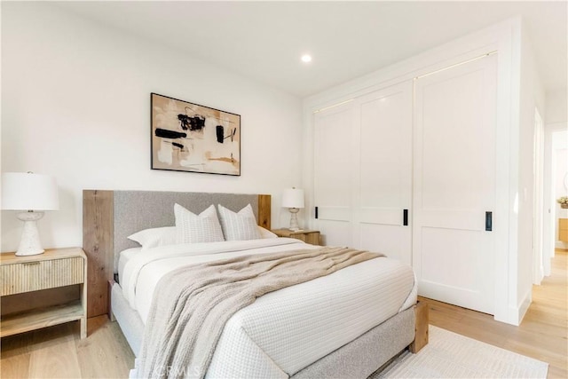 1759 Glenneyre St, Laguna Beach, CA 92651 - bedroom with light wood-type flooring, a closet, recessed lighting, and baseboards