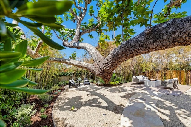 1759 Glenneyre St, Laguna Beach, CA 92651 - view of patio / terrace featuring fence and an outdoor living space with a fire pit