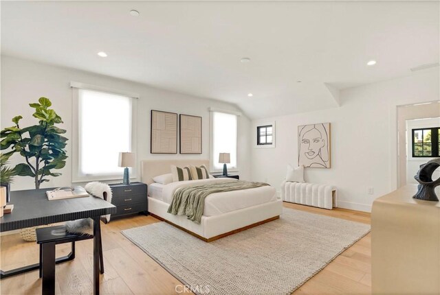 1759 Glenneyre St, Laguna Beach, CA 92651 - bedroom with light wood finished floors, radiator heating unit, lofted ceiling, recessed lighting, and baseboards