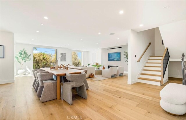 1759 Glenneyre St, Laguna Beach, CA 92651 - dining area with stairway, light wood-style flooring, recessed lighting, and baseboards