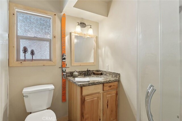 385 Iris Dr, Twin Peaks, CA 92391 - bathroom with toilet, vanity, and a shower
