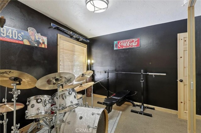 385 Iris Dr, Twin Peaks, CA 92391 - workout room with carpet flooring and baseboards