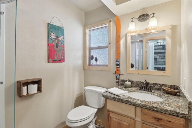 385 Iris Dr, Twin Peaks, CA 92391 - bathroom featuring toilet and vanity