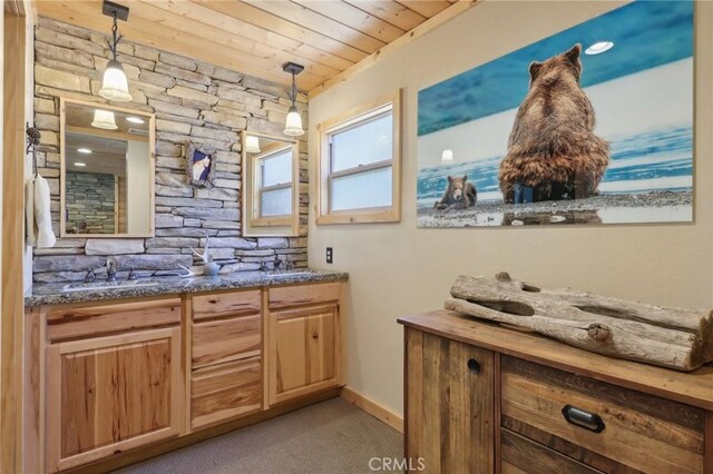 385 Iris Dr, Twin Peaks, CA 92391 - bathroom featuring wood ceiling, double vanity, and baseboards