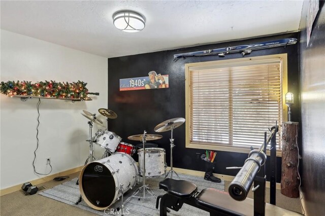 385 Iris Dr, Twin Peaks, CA 92391 - exercise room featuring carpet floors and baseboards