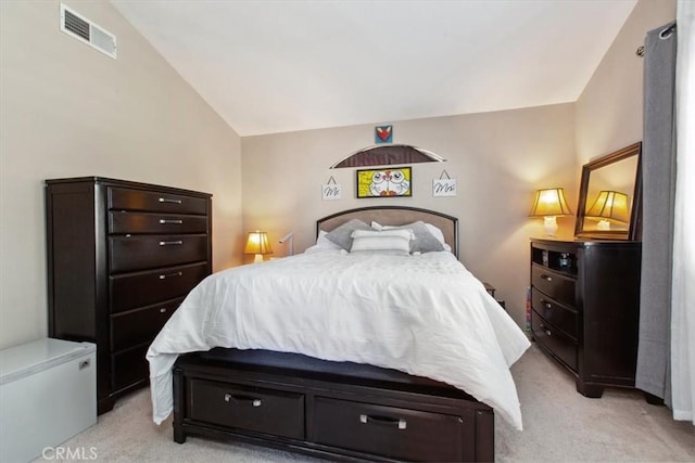 12427 Stardell Ln, Yucaipa, CA 92399 - bedroom featuring light colored carpet and vaulted ceiling