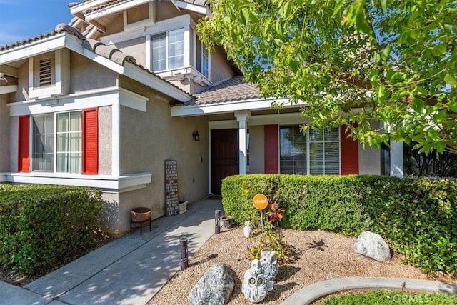 12427 Stardell Ln, Yucaipa, CA 92399 - view of exterior entry with stucco siding