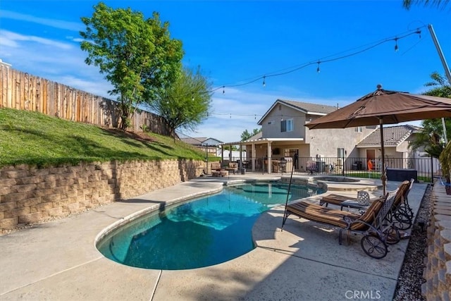 12427 Stardell Ln, Yucaipa, CA 92399 - view of swimming pool featuring a fenced backyard, a patio area, and an in-ground hot tub