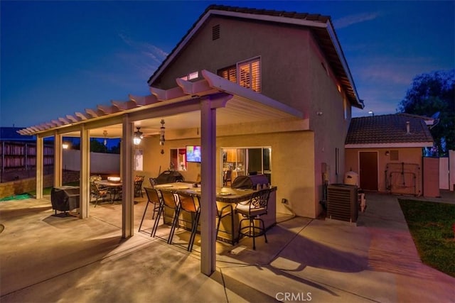 12427 Stardell Ln, Yucaipa, CA 92399 - view of patio featuring central AC unit, fence, and outdoor dining space