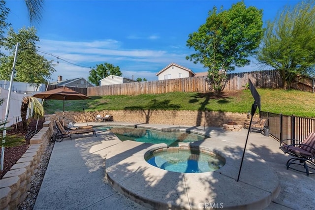 12427 Stardell Ln, Yucaipa, CA 92399 - view of swimming pool featuring a fenced backyard, a patio area, and a pool with connected hot tub