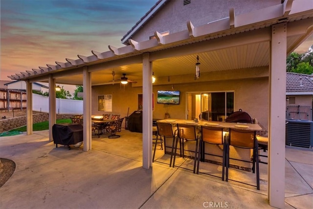 12427 Stardell Ln, Yucaipa, CA 92399 - view of patio / terrace with fence, ceiling fan, and outdoor dining space