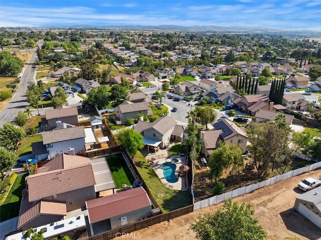 12427 Stardell Ln, Yucaipa, CA 92399 - aerial perspective of suburban area with a pool and a mountainous background