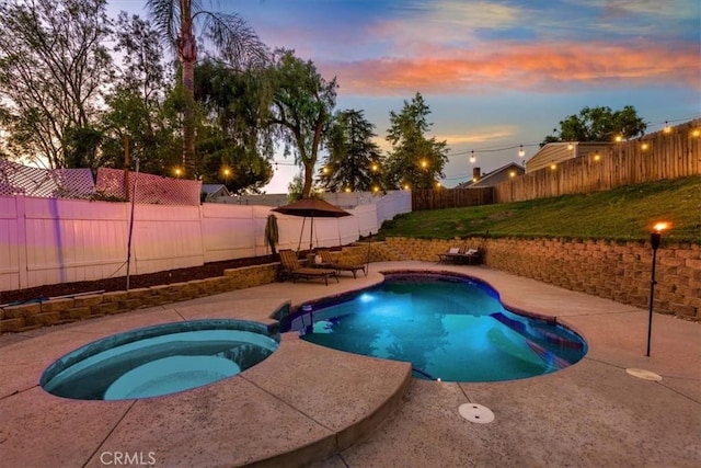 12427 Stardell Ln, Yucaipa, CA 92399 - view of pool featuring a fenced backyard, a patio, and a pool with connected hot tub