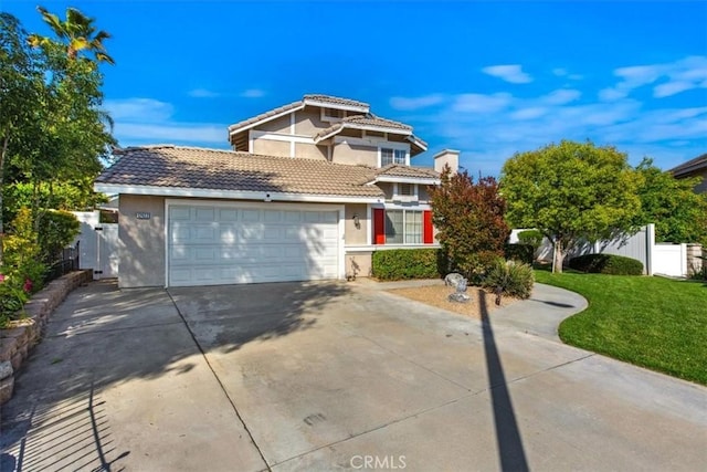 12427 Stardell Ln, Yucaipa, CA 92399 - traditional-style house featuring concrete driveway, stucco siding, a tile roof, and an attached garage