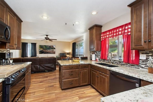 12427 Stardell Ln, Yucaipa, CA 92399 - kitchen featuring dishwashing machine, a sink, light wood-type flooring, backsplash, and recessed lighting