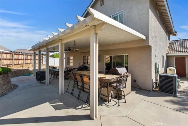 12427 Stardell Ln, Yucaipa, CA 92399 - view of patio / terrace featuring fence, ceiling fan, outdoor dining space, and central air condition unit
